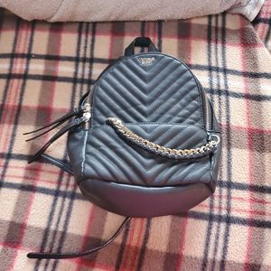 Black Leather Backpack with Chain Detail